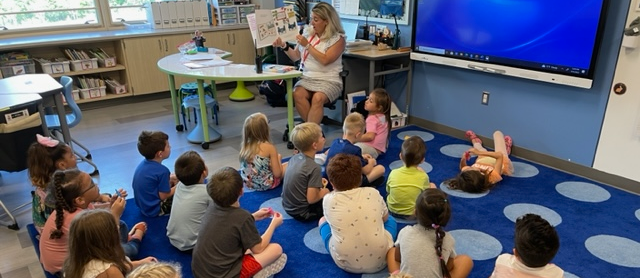 students listening to a story being read