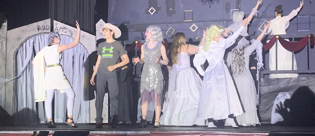 Students on stage in costume