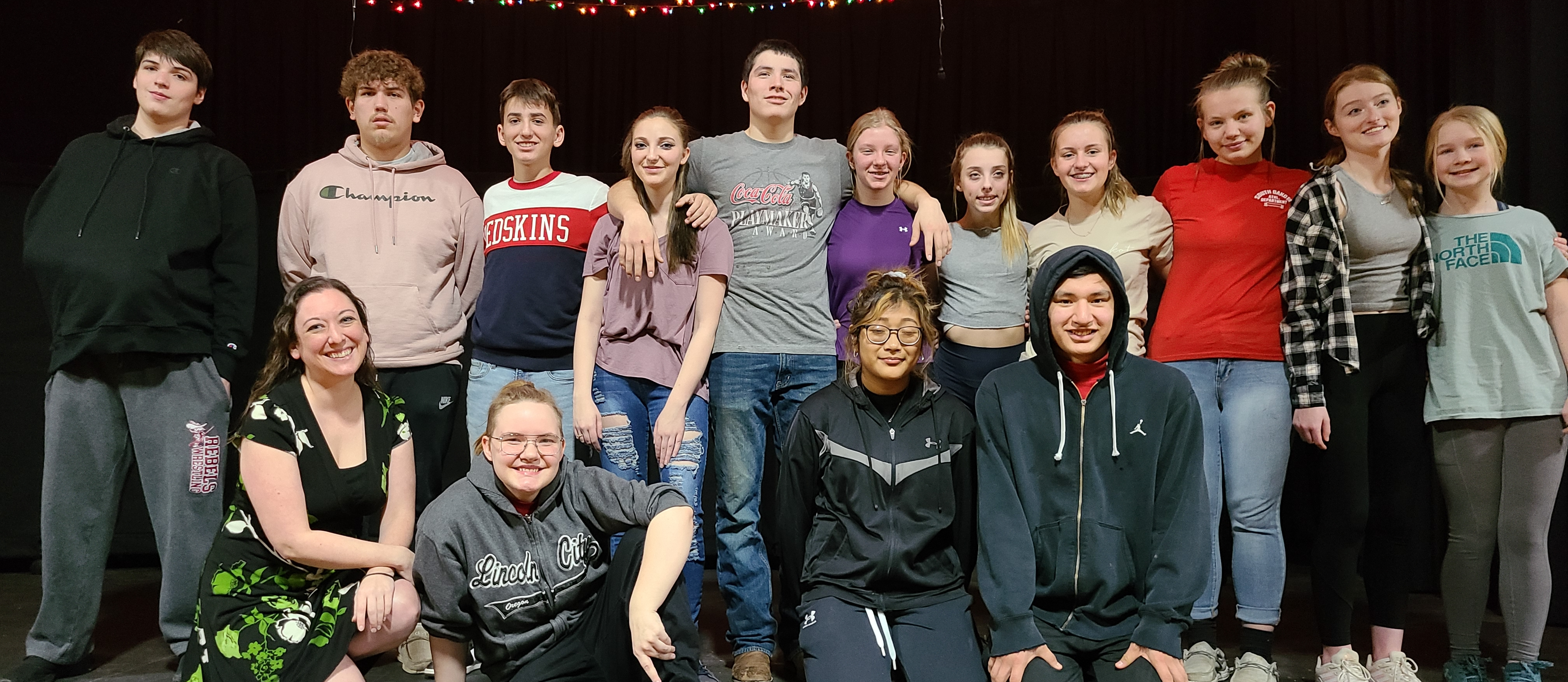 Students on stage posing for One Act