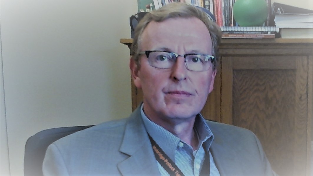 Dr. Tim L. Frederick