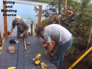 photo of people working on a garden structure