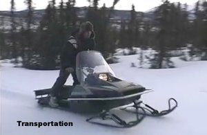 photo of someone on a snowmobile 