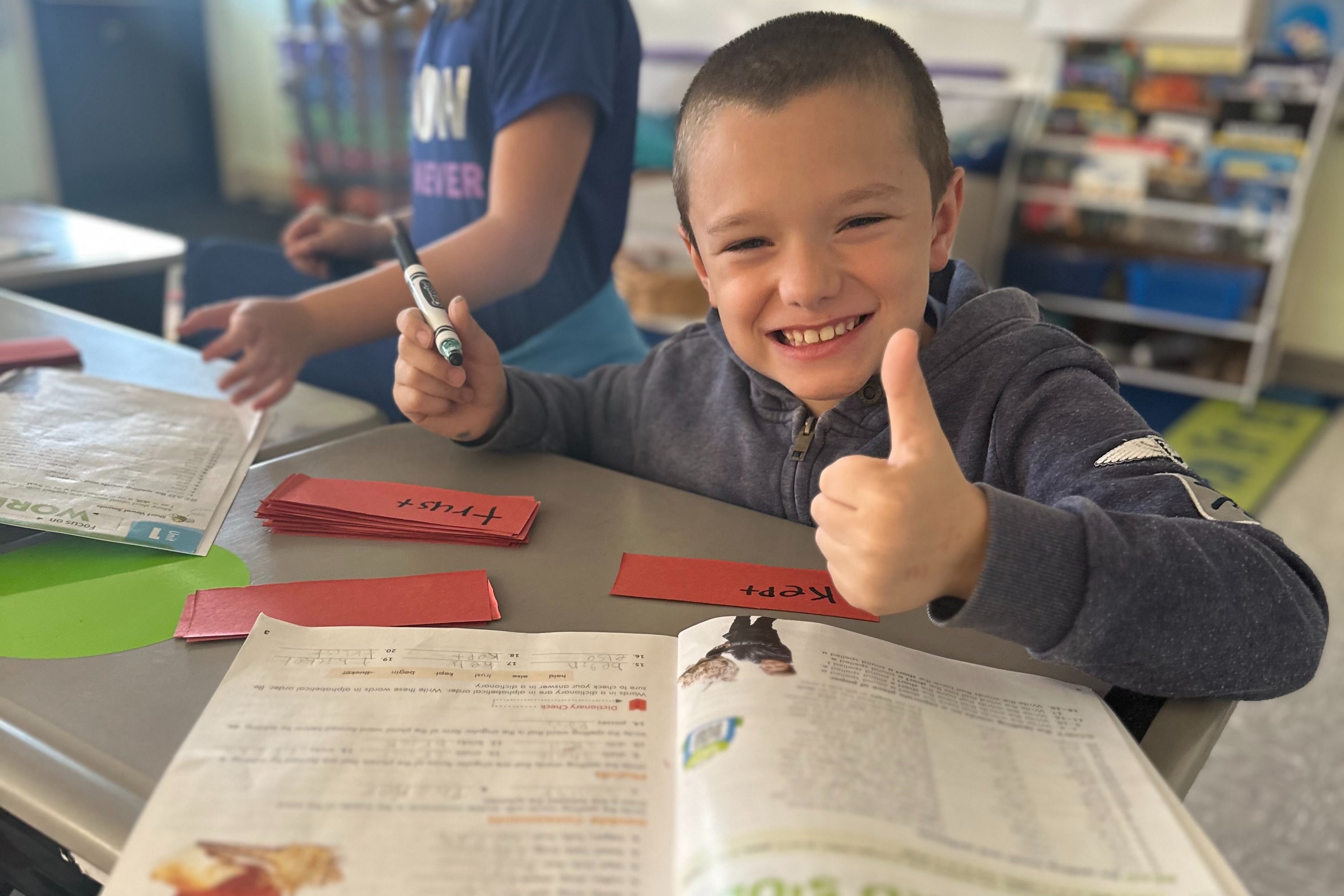 Child working on a Chromebook.