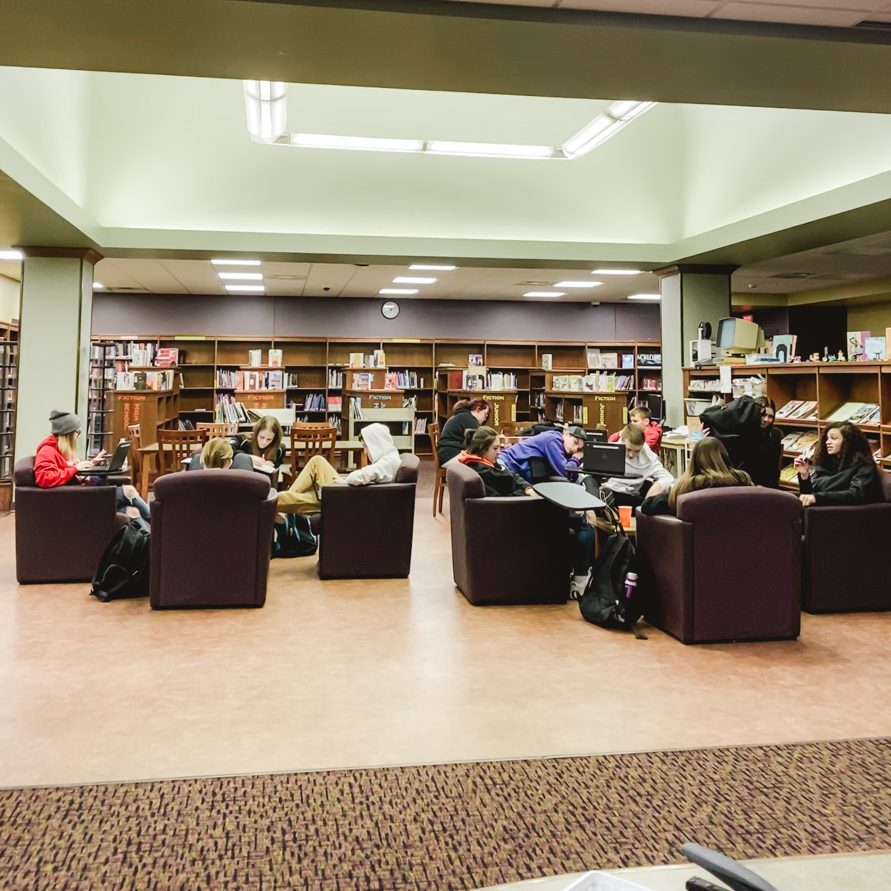 students sitting in the library