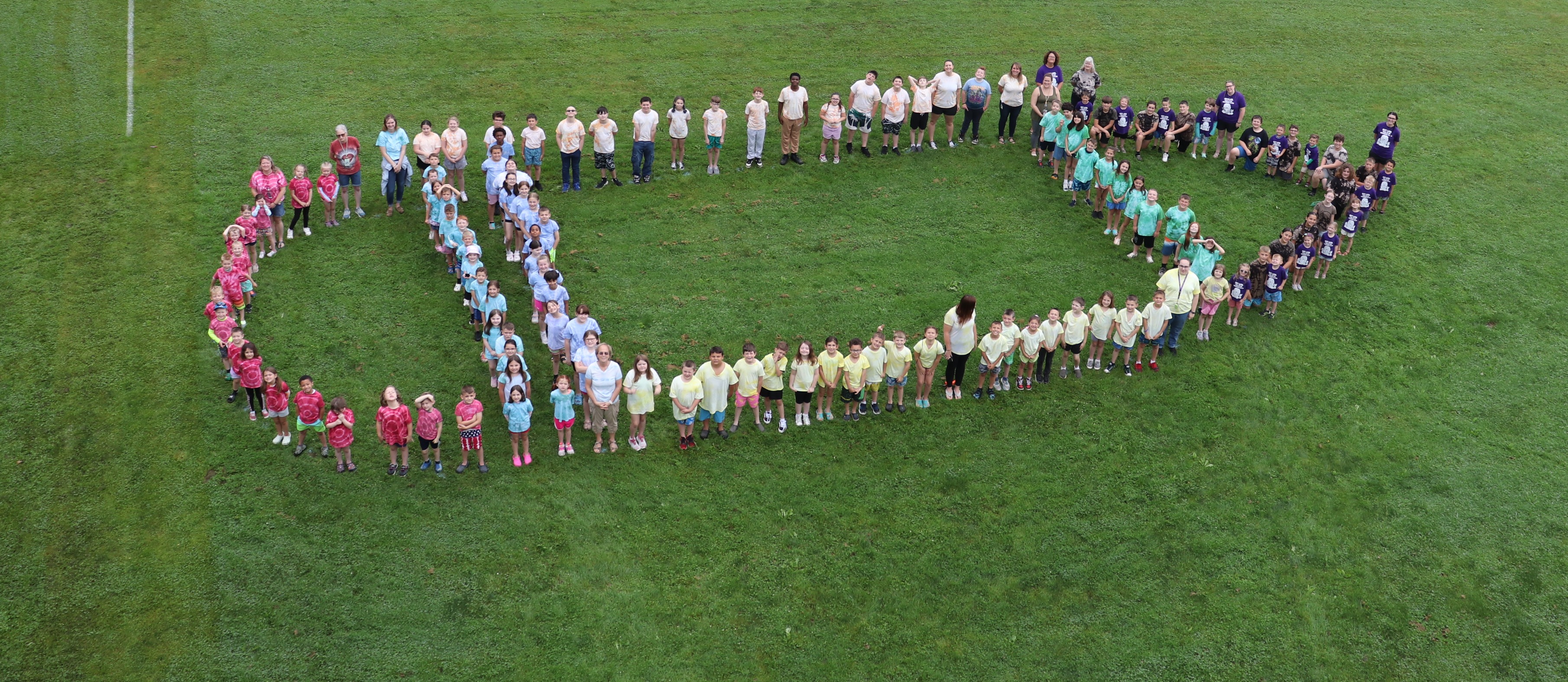 students in the shape of a pencil