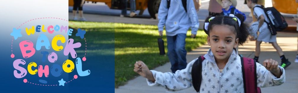 Student with arms extended walks up the sidewalk to school on first day