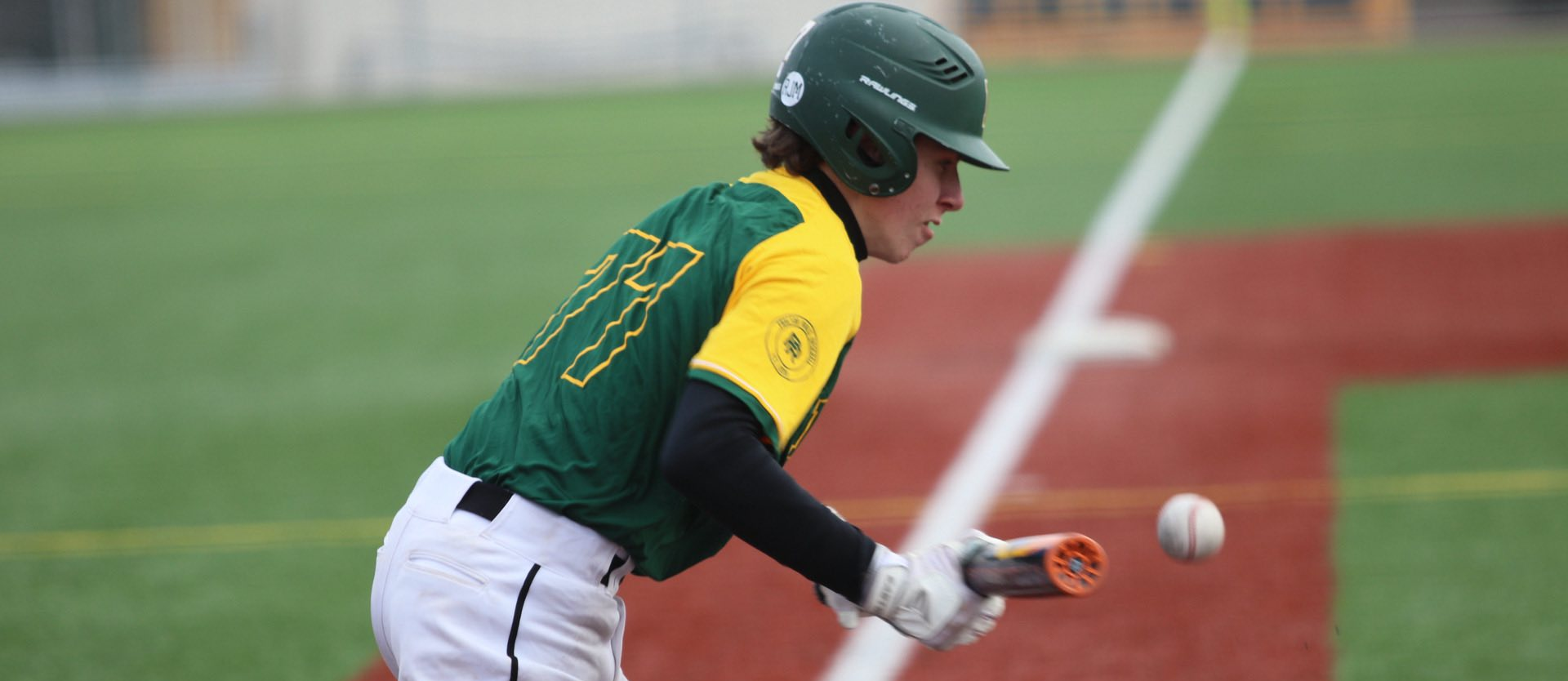 Proctor Baseball laying down a bunt