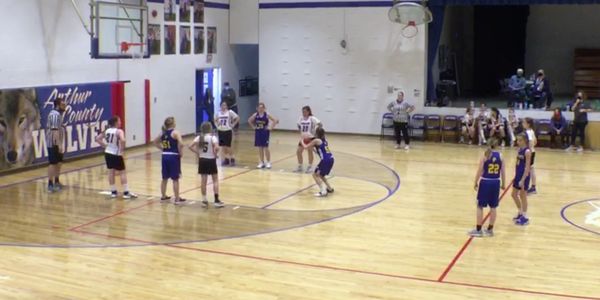 Two girls basketball teams. South Platte girl at the foul line taking a s shot