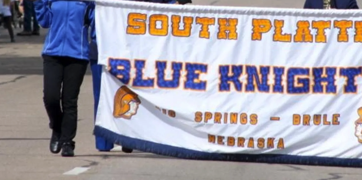 Parade sign for South Platte Blue Knights marching band