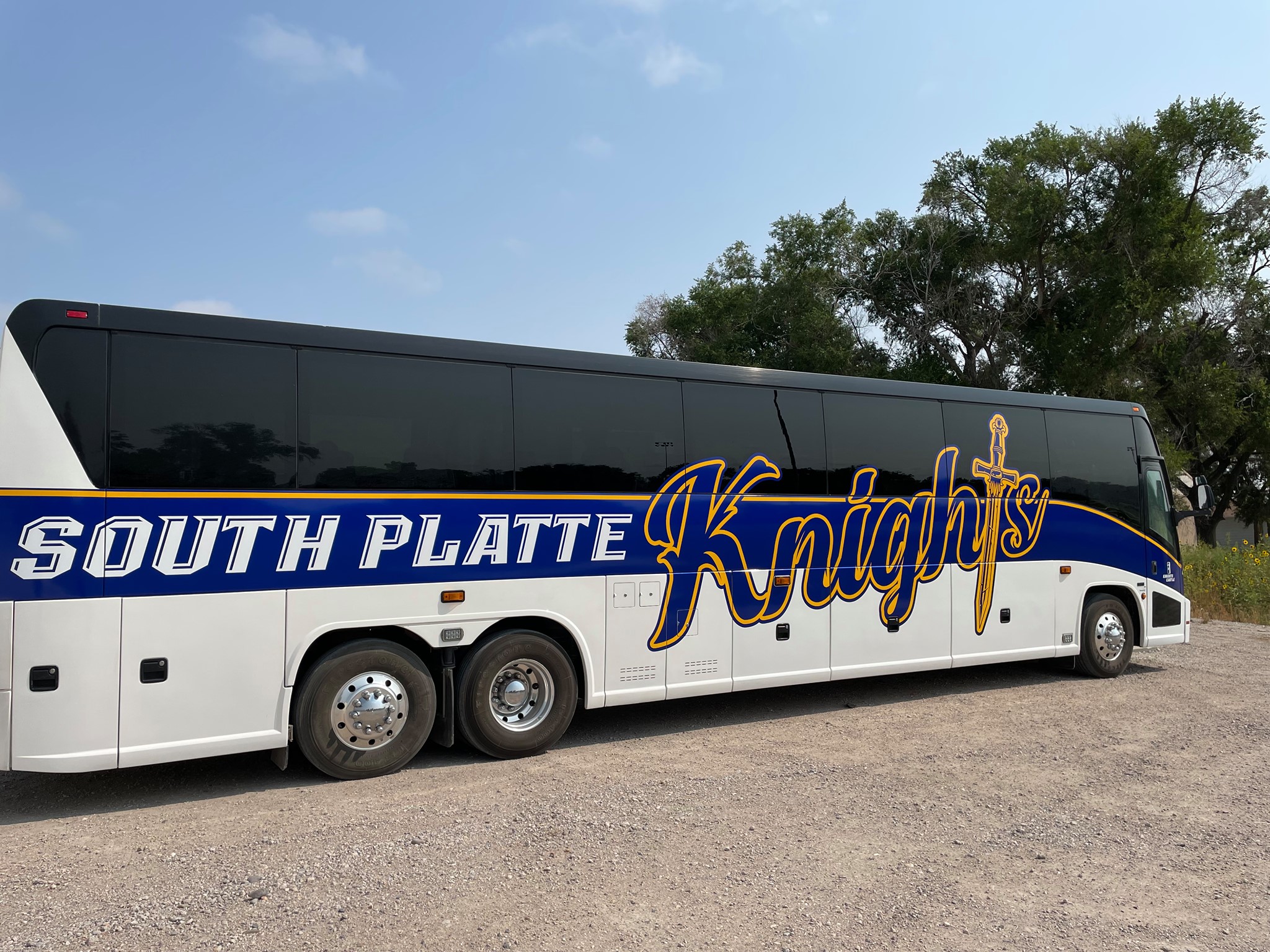 Charter bus labeled South Platte Knights