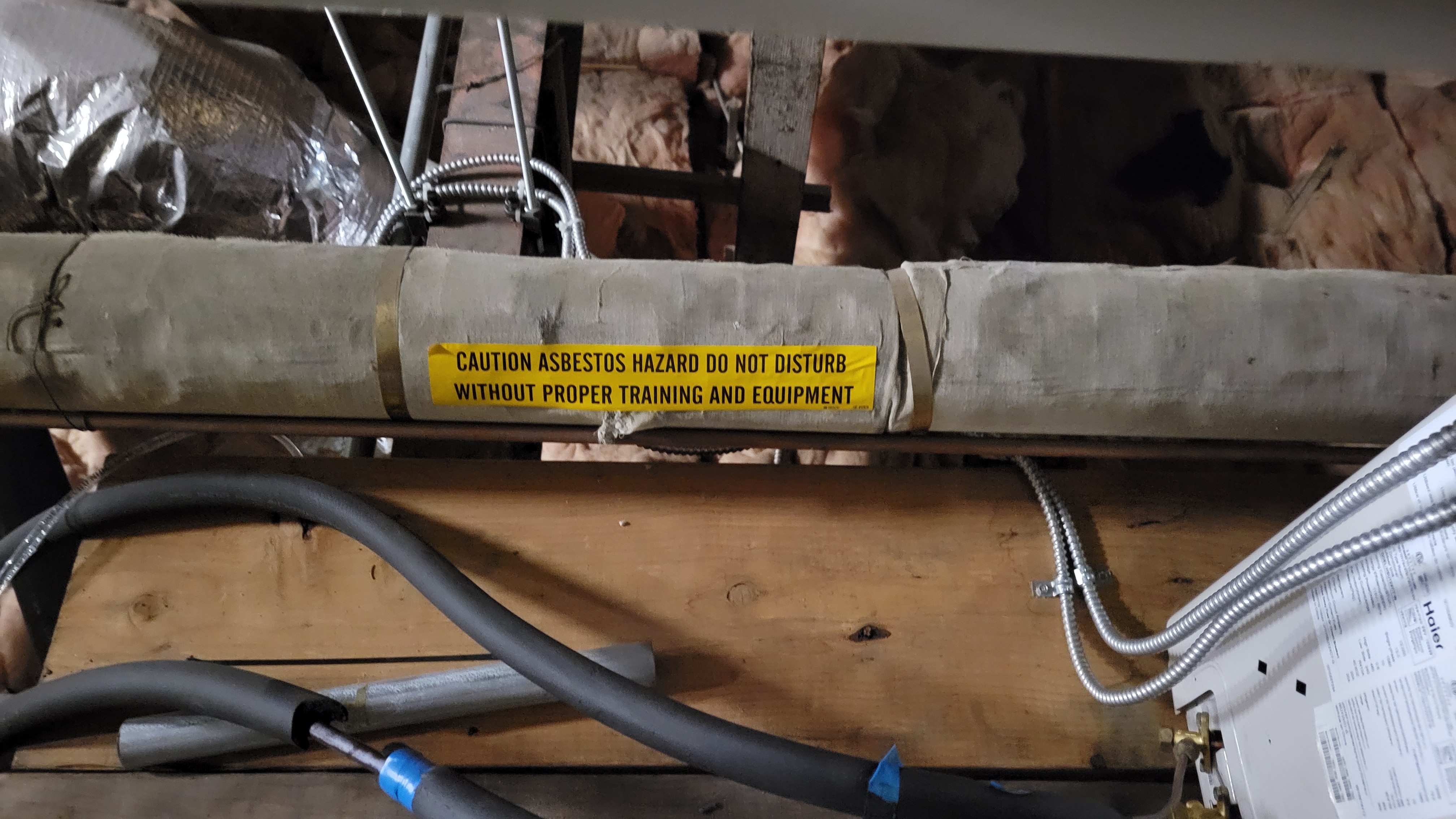 Asbestos surrounds a pipe