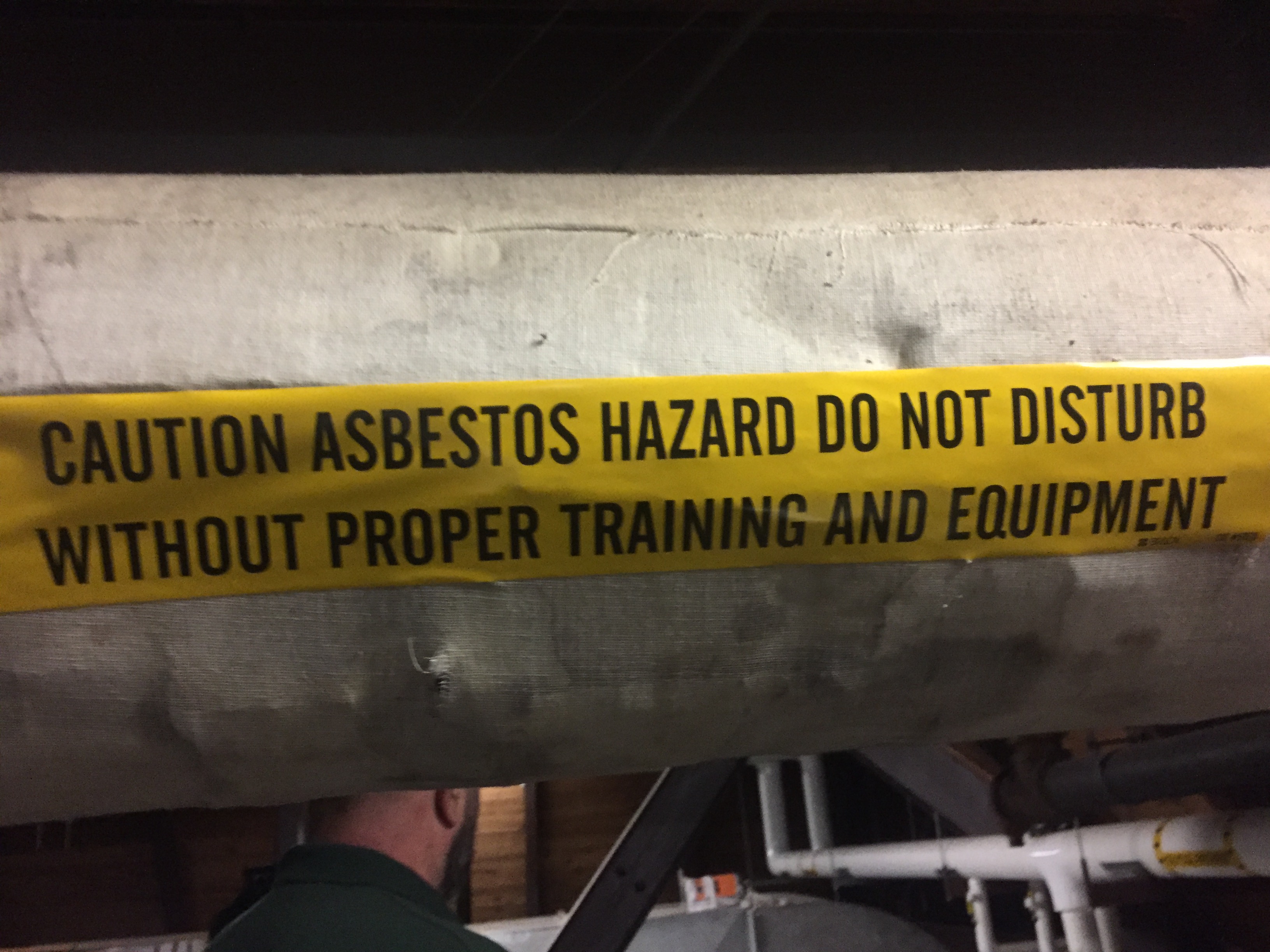 asbestos surrounds a pipe