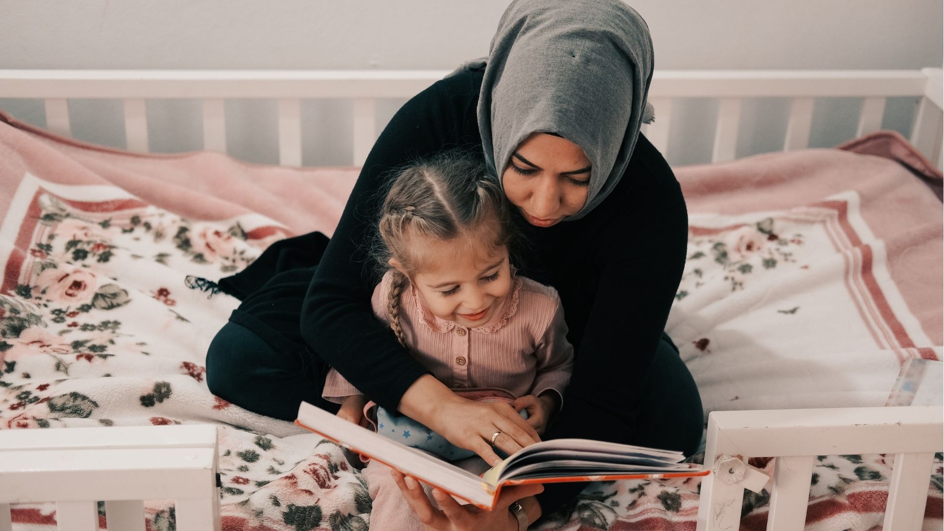 Mother reading to child
