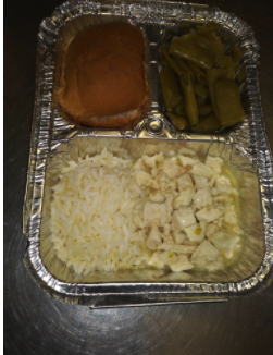 Photo of chicken and rice, green beans, biscuit