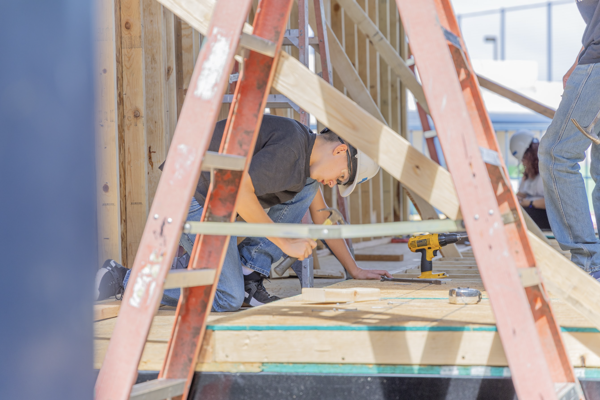 Construction Student working on building