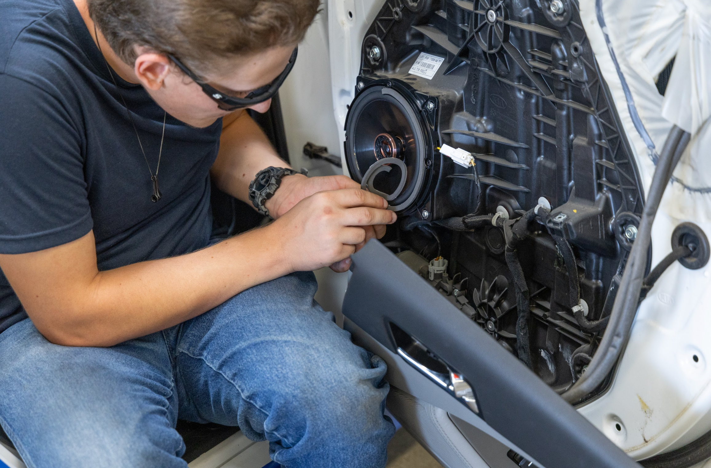 CTE Student checking a car engine