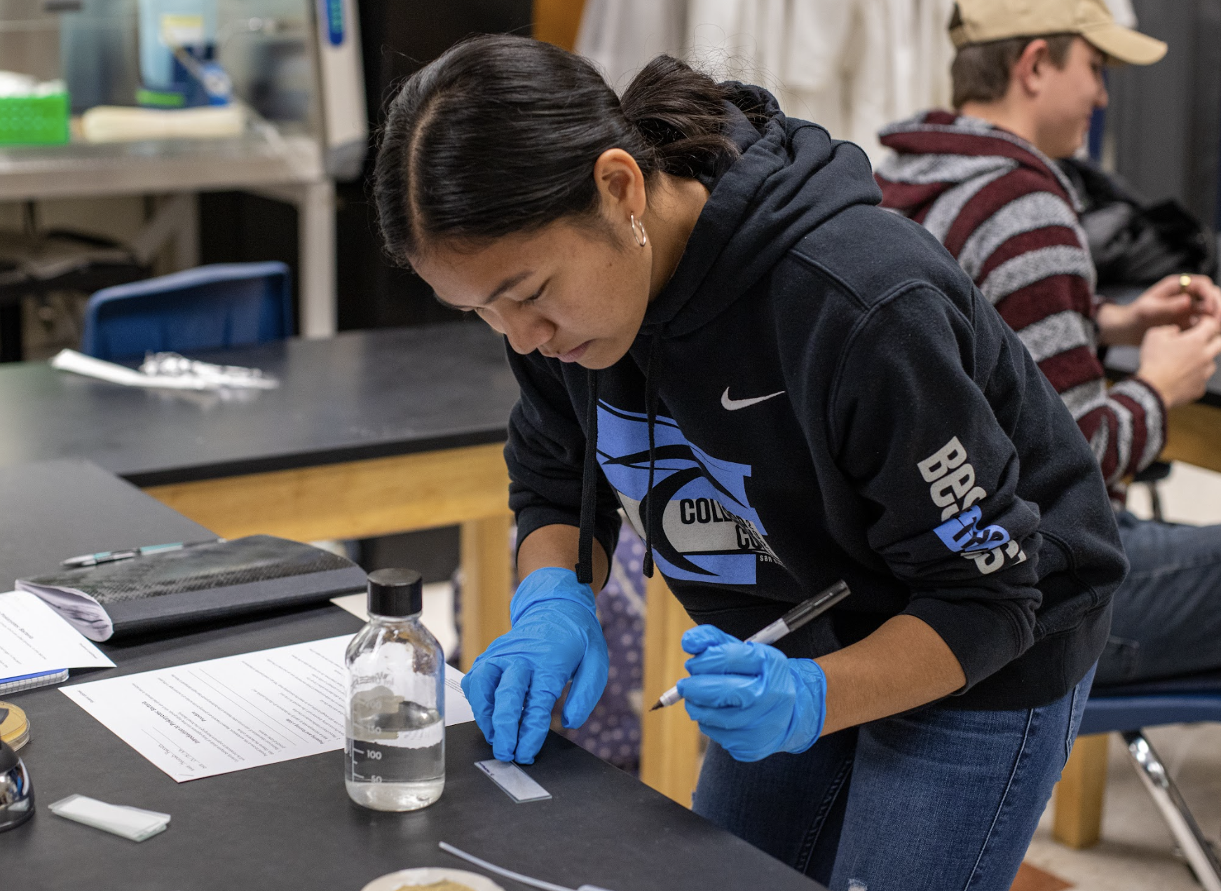 CTE student working on an experiment