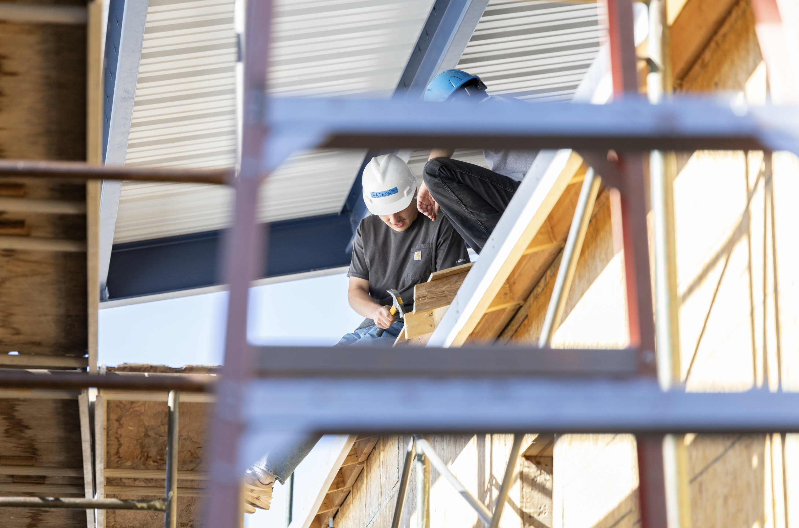 Construction Students working on building