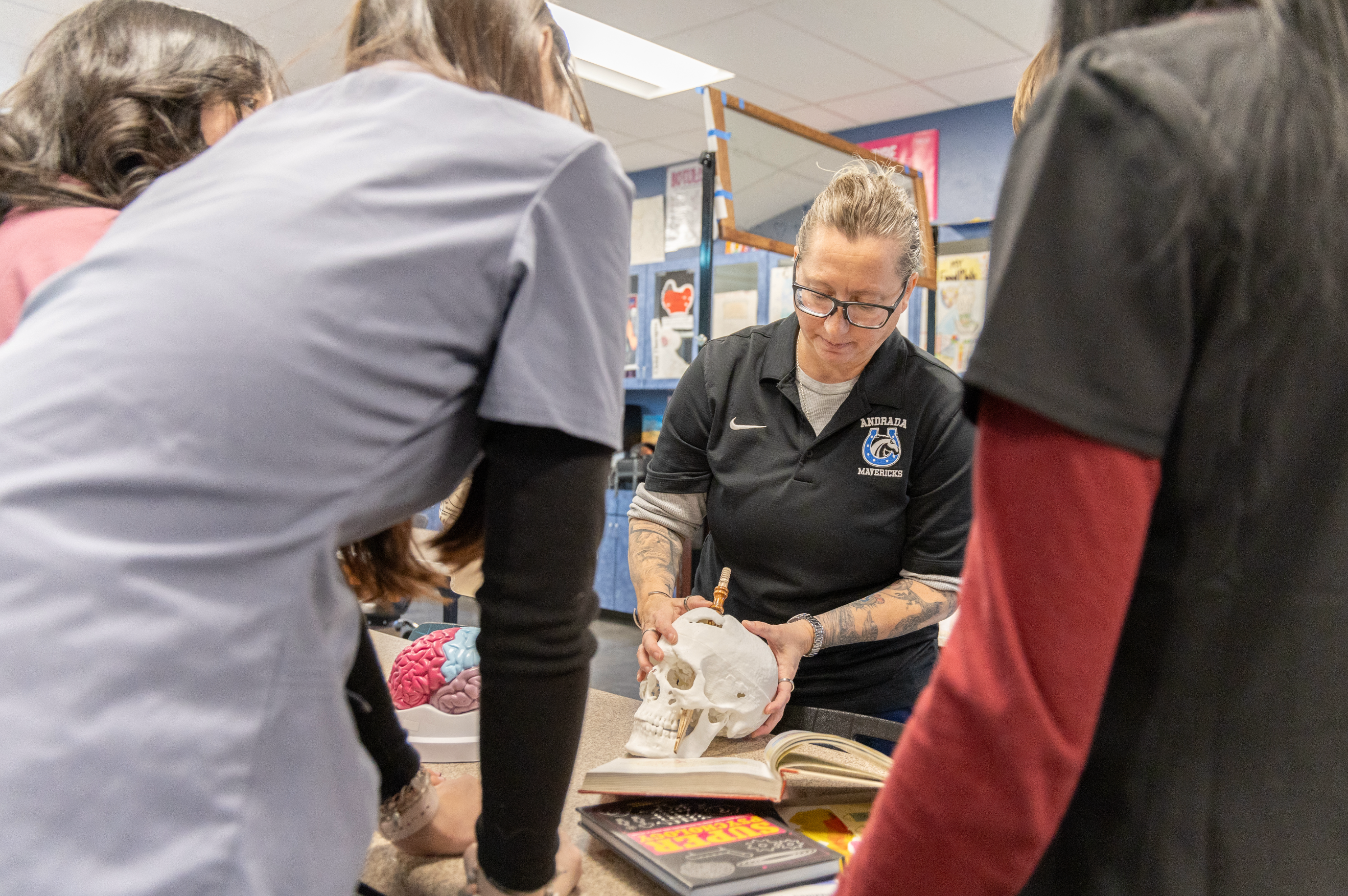 CTE student studying the brain structure with teacher