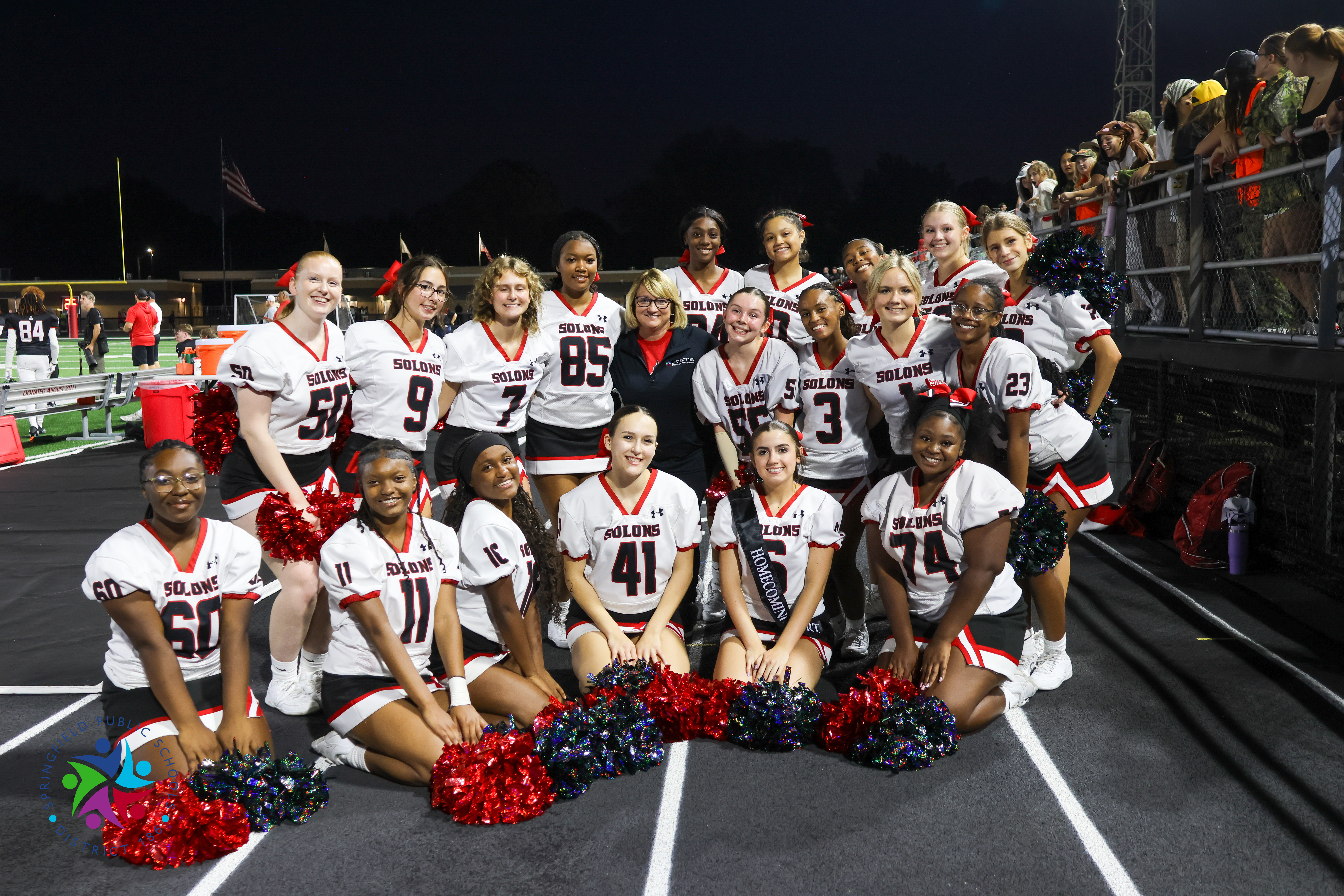 Superintendent Gill with Cheerleaders