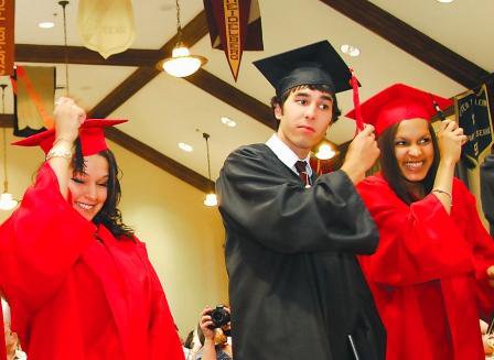 Graduates turning the tassel