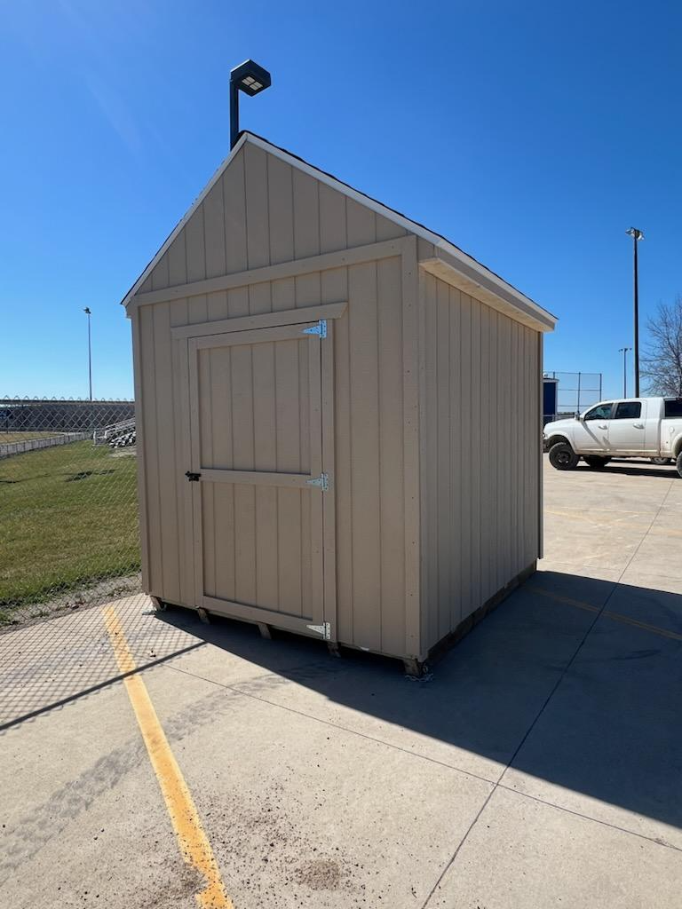 Front/side view of shed for sale.