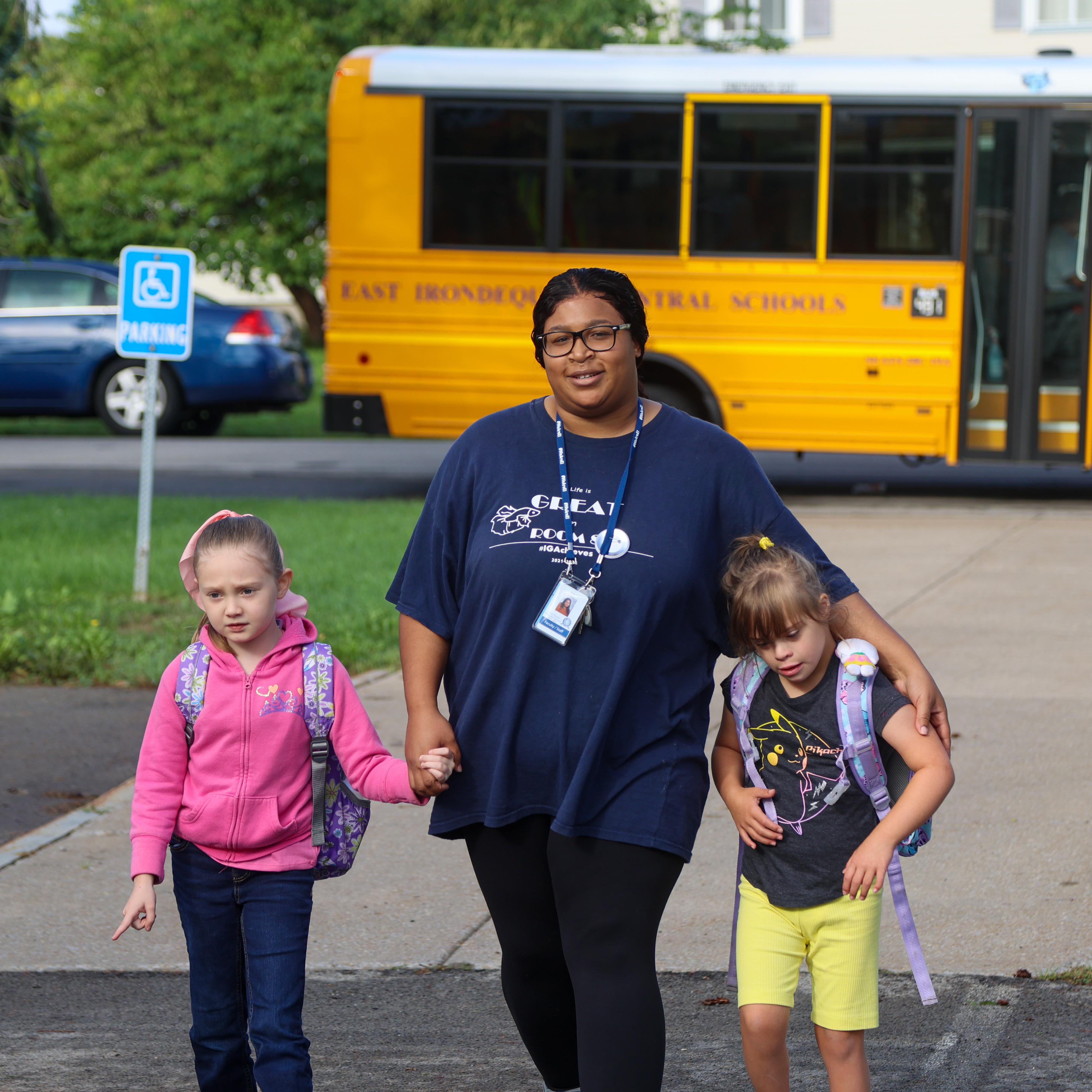 Students and their teacher aide