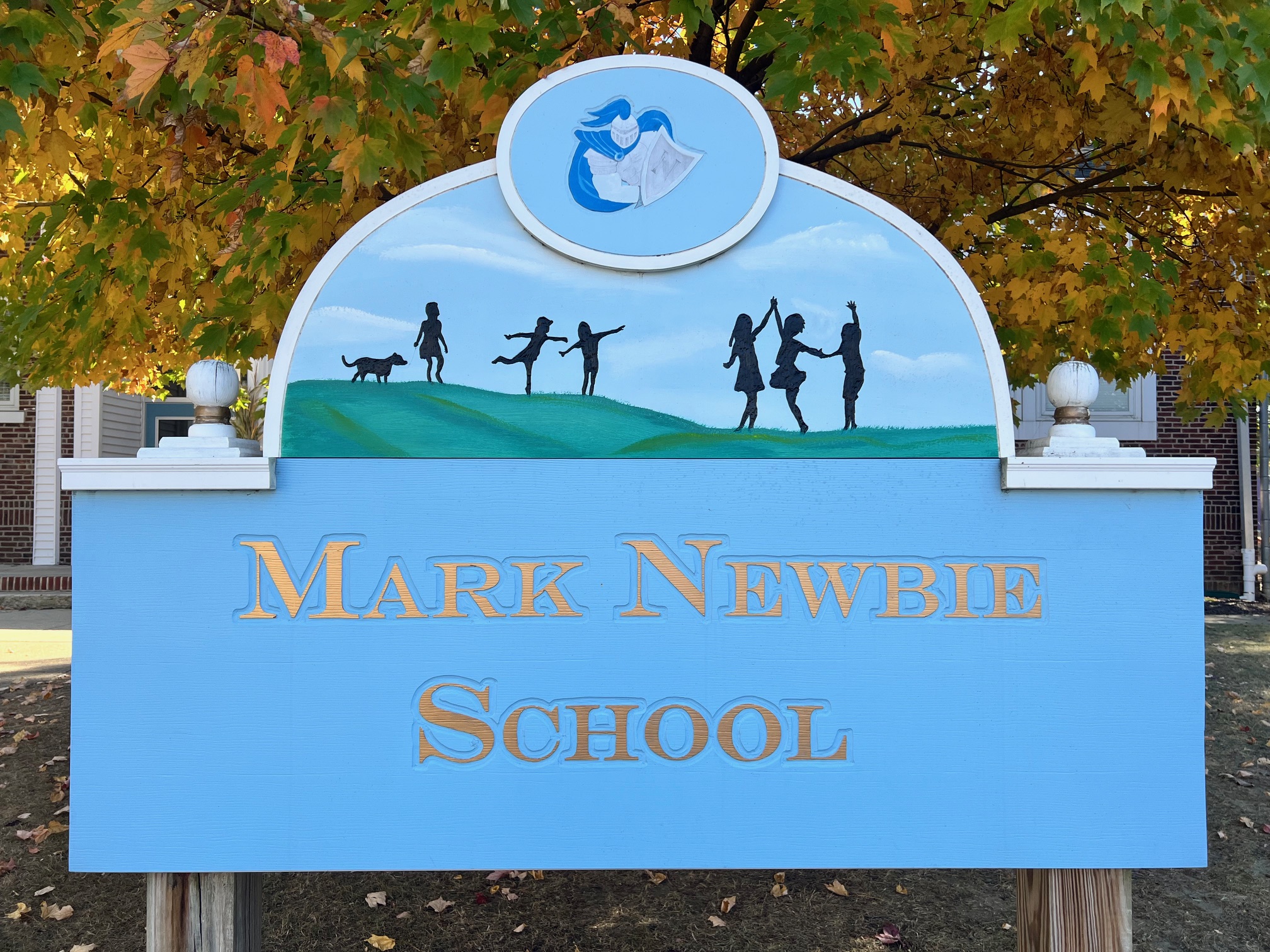 Mark Newbie Sign-located at the front of our building