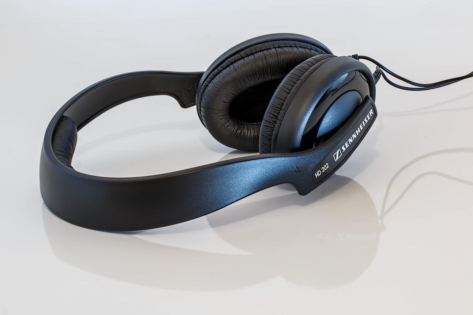 a pair of black, corded headphones