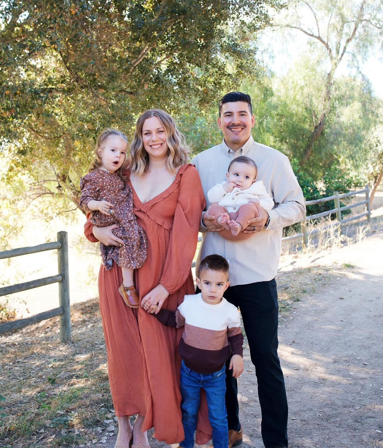 mrs. cantu and her family smiling 