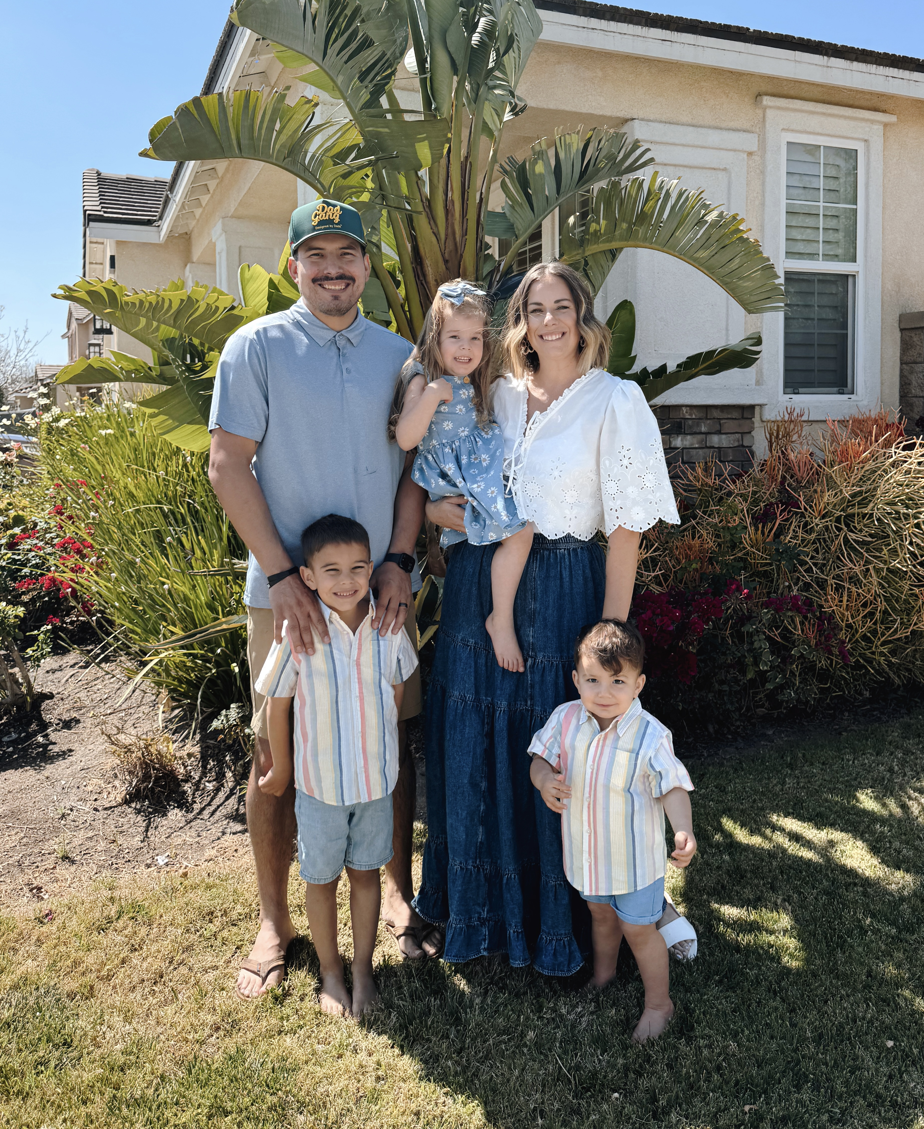 mrs. cantu smiling with her family