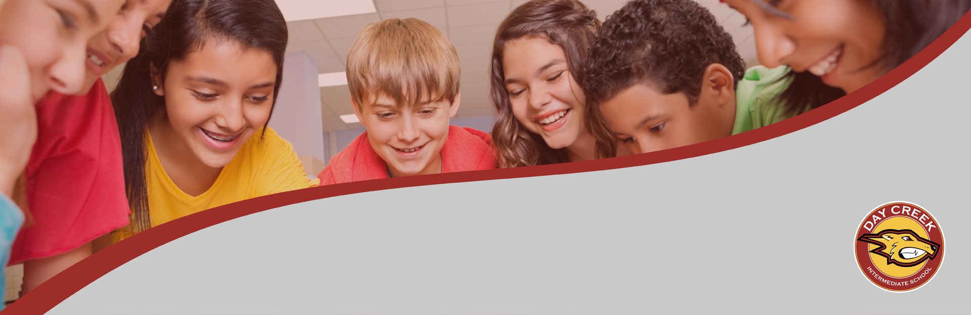 Students smiling and school logo