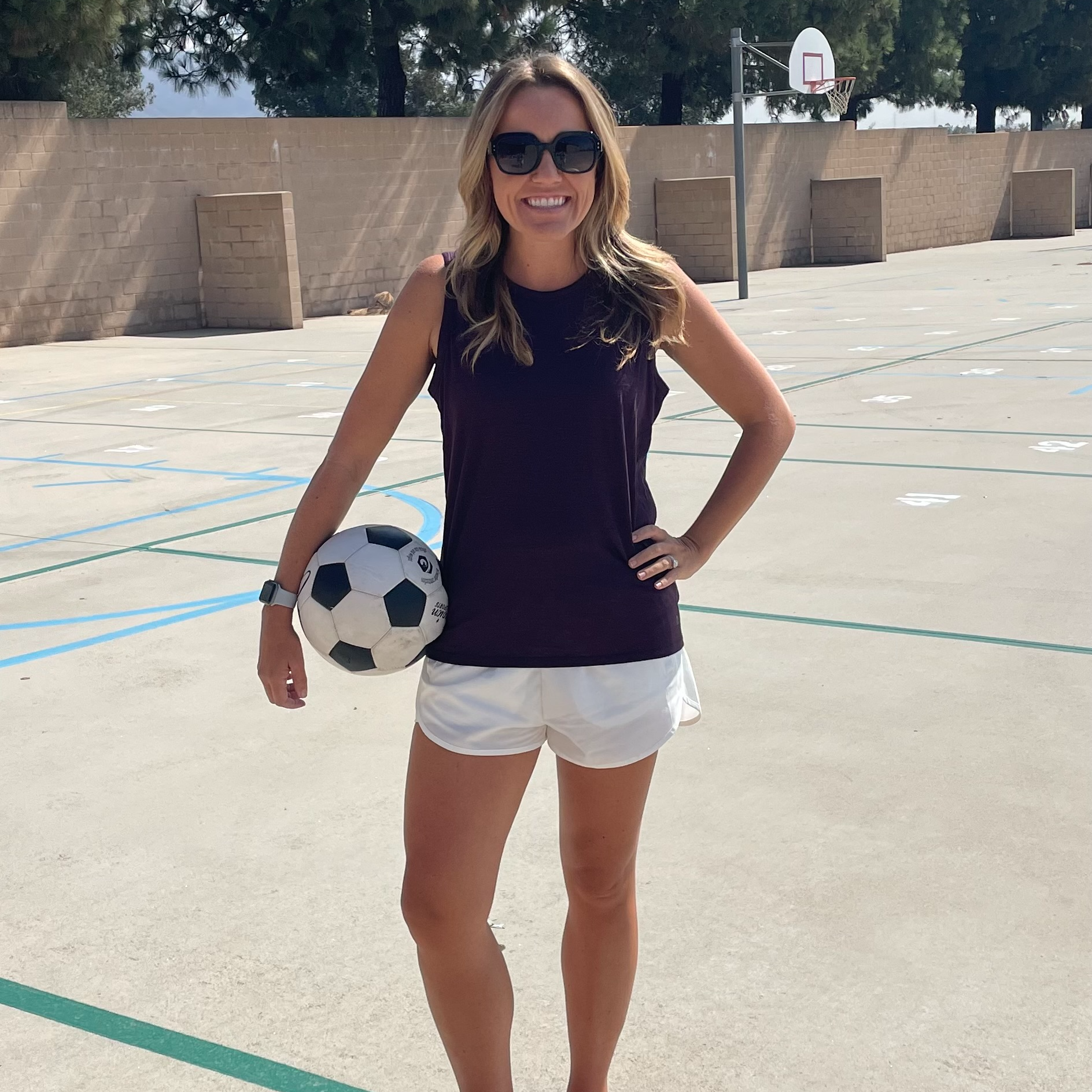 Kellie Beitler holding a soccerball