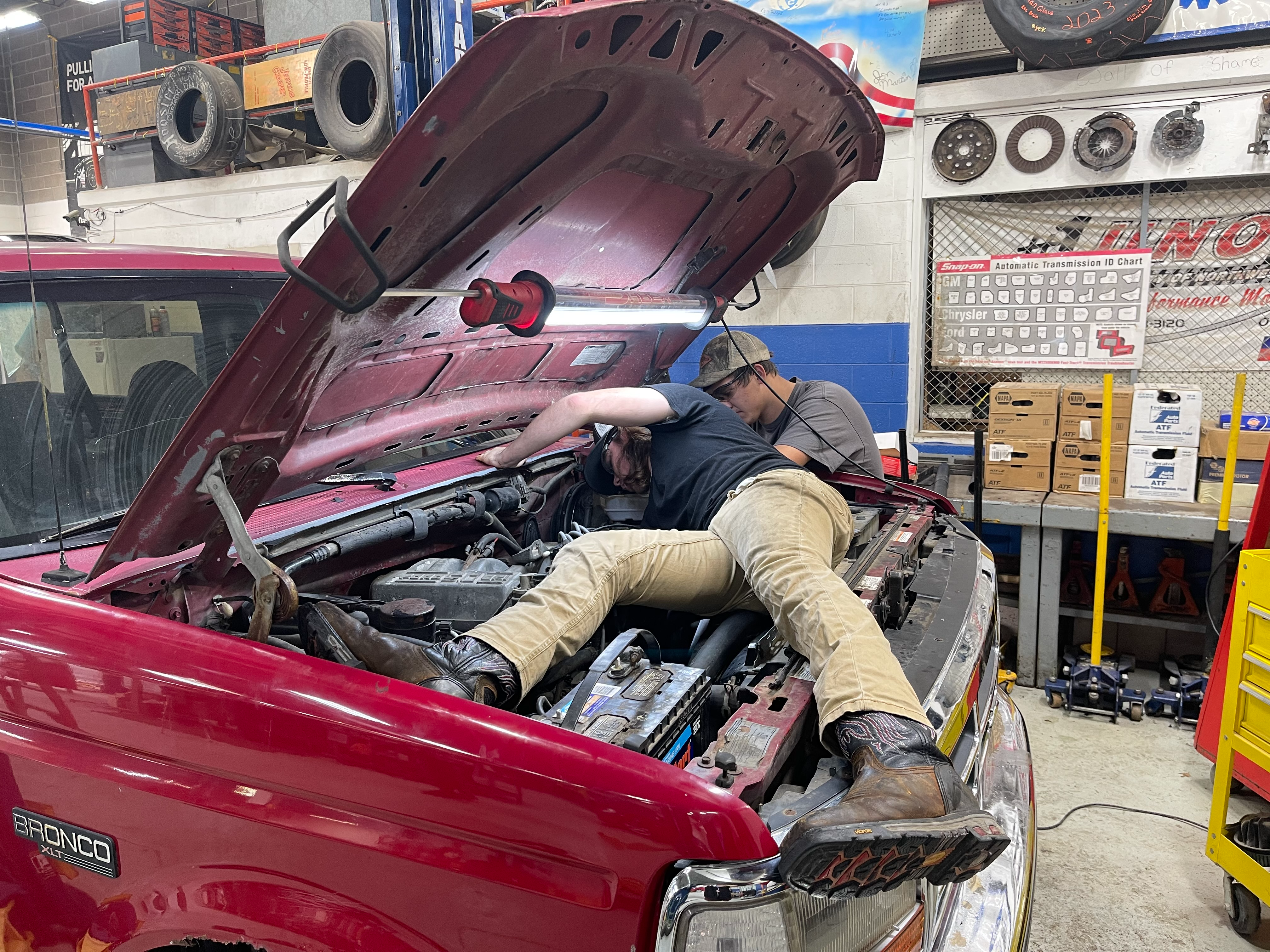 Mechanic checking a car engine