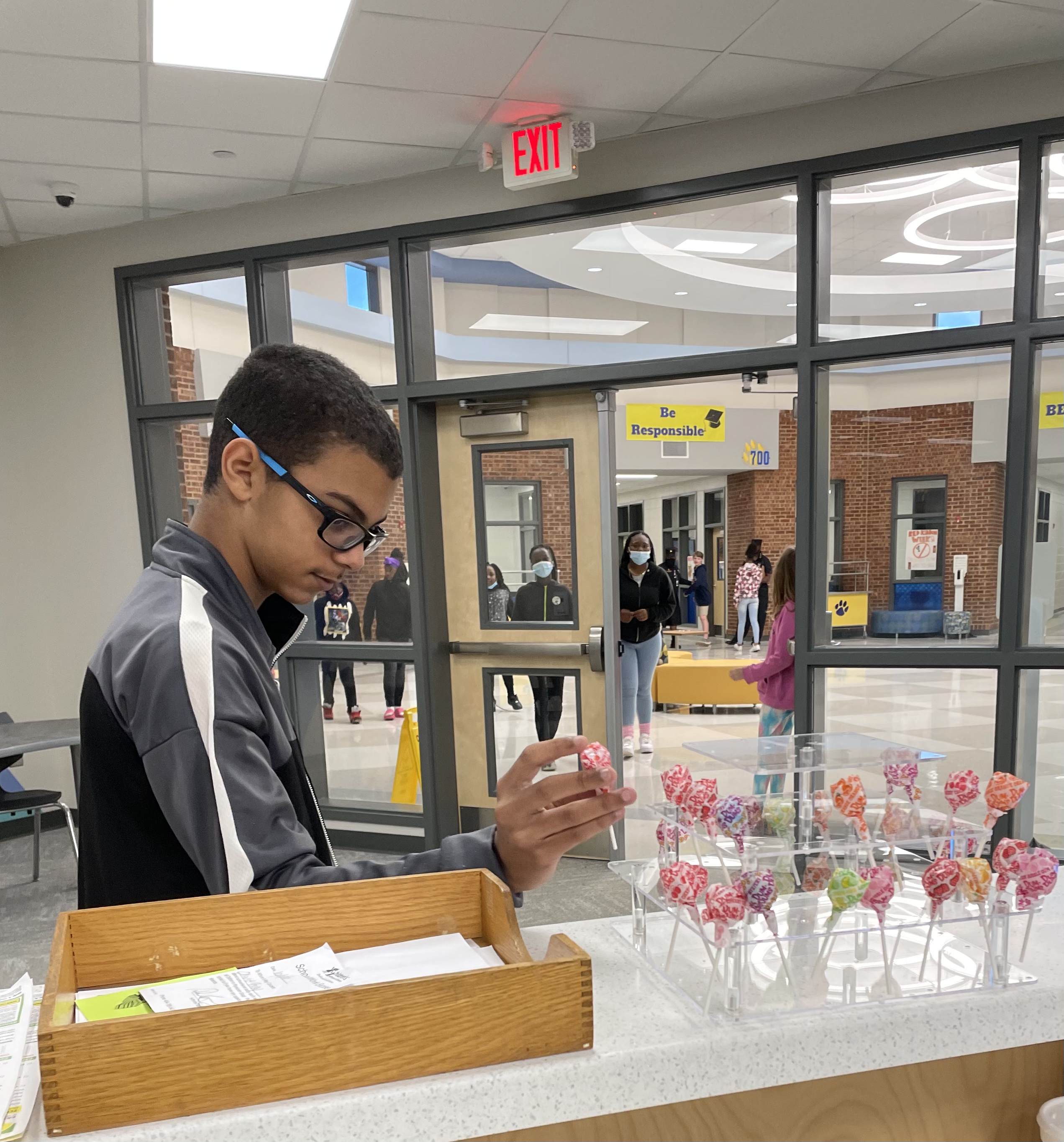Students receiving treat for appreciation station