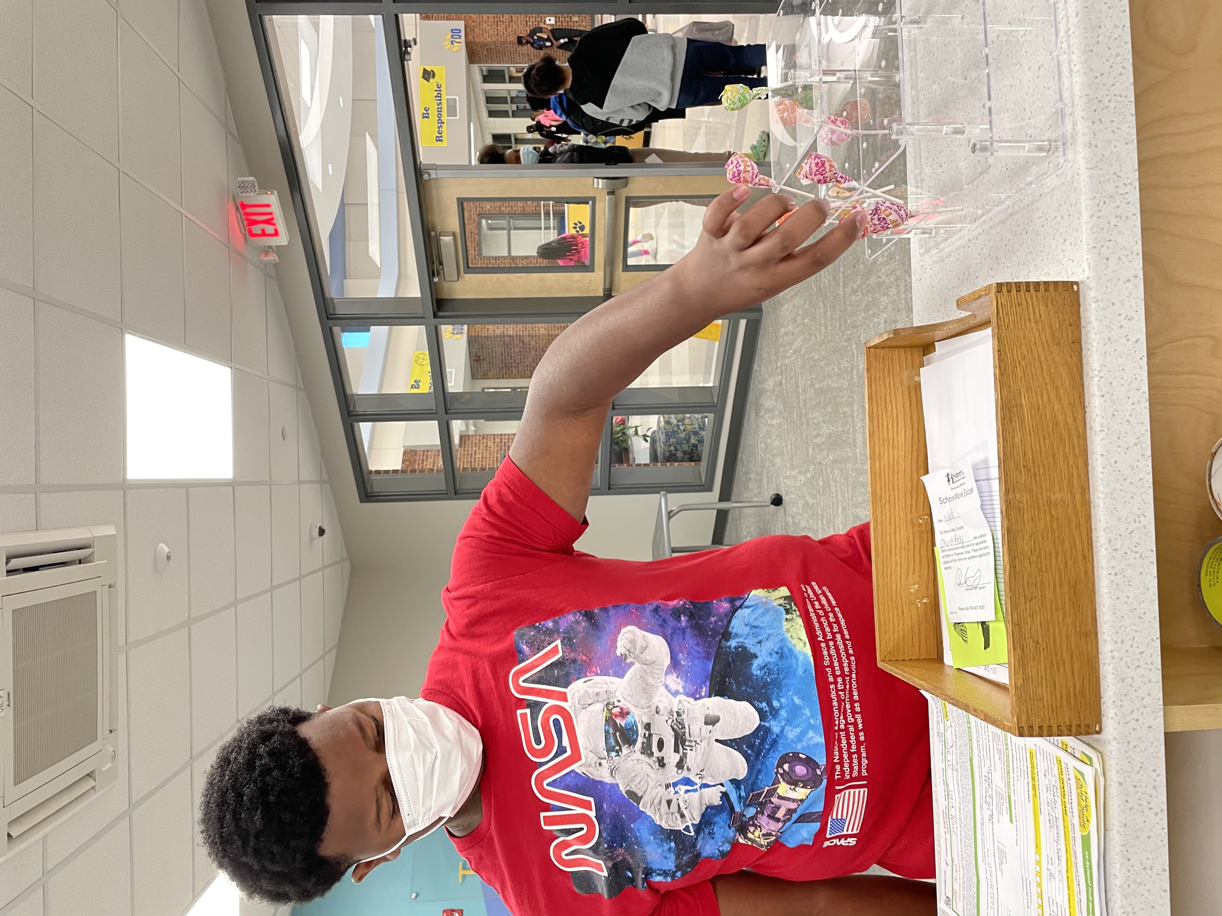 Students receiving treat for appreciation station