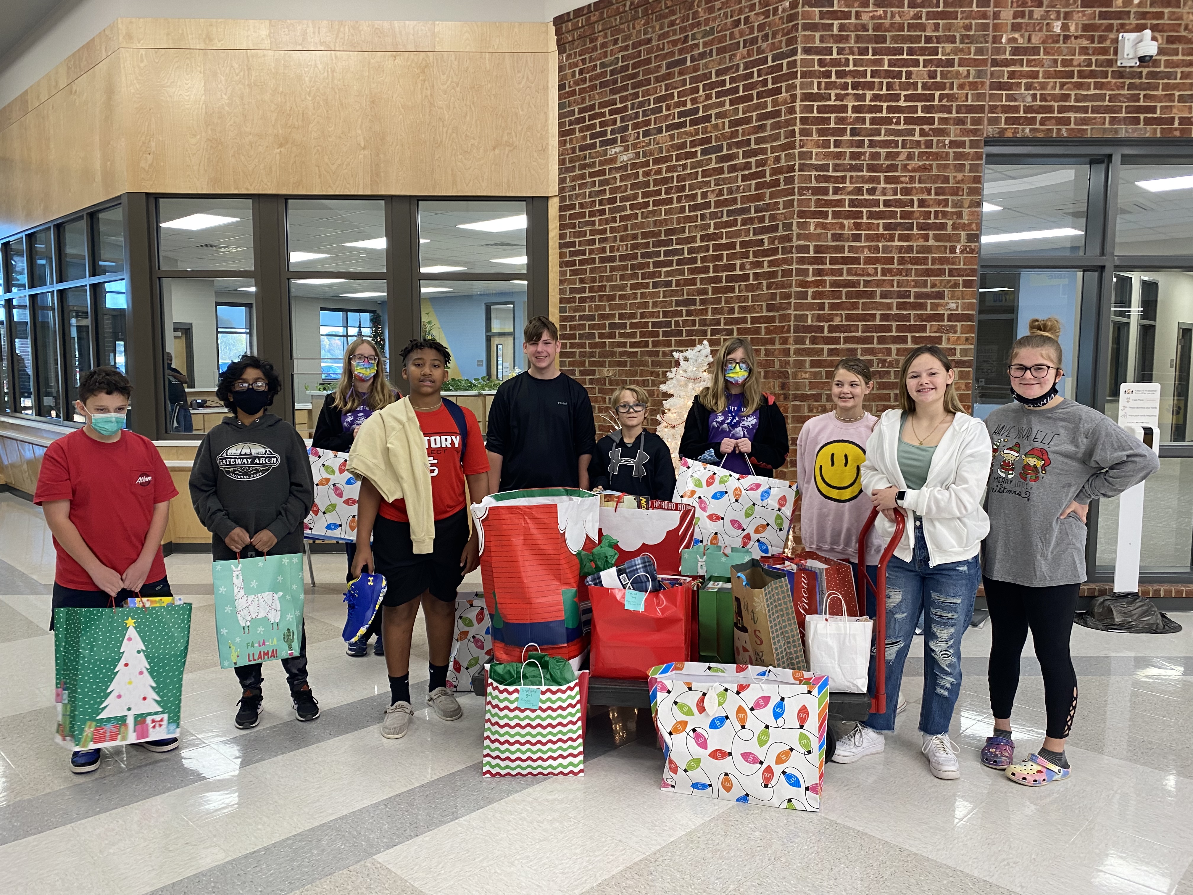 Students donating Christmas bags 