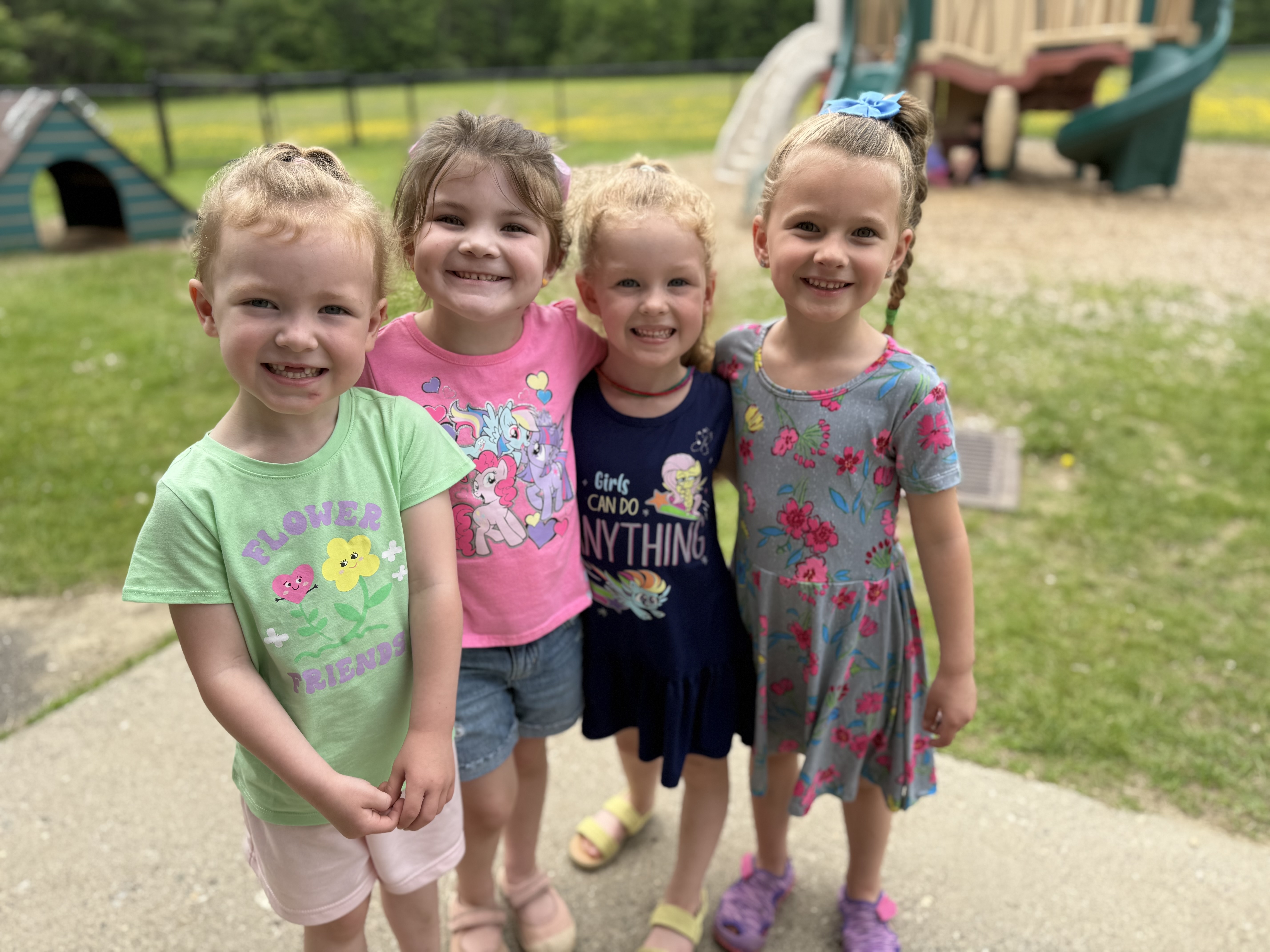 4 prek girls smiling