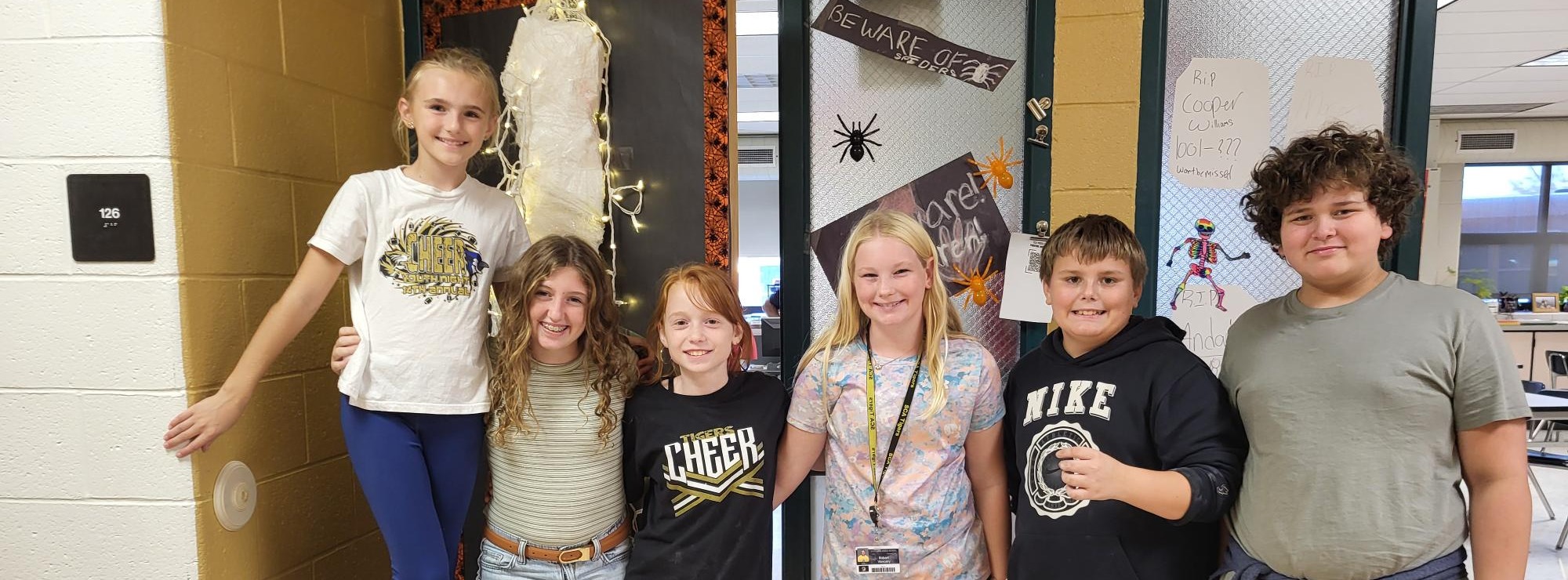 students decorating for halloween