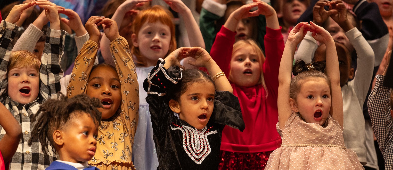 students dance and sing