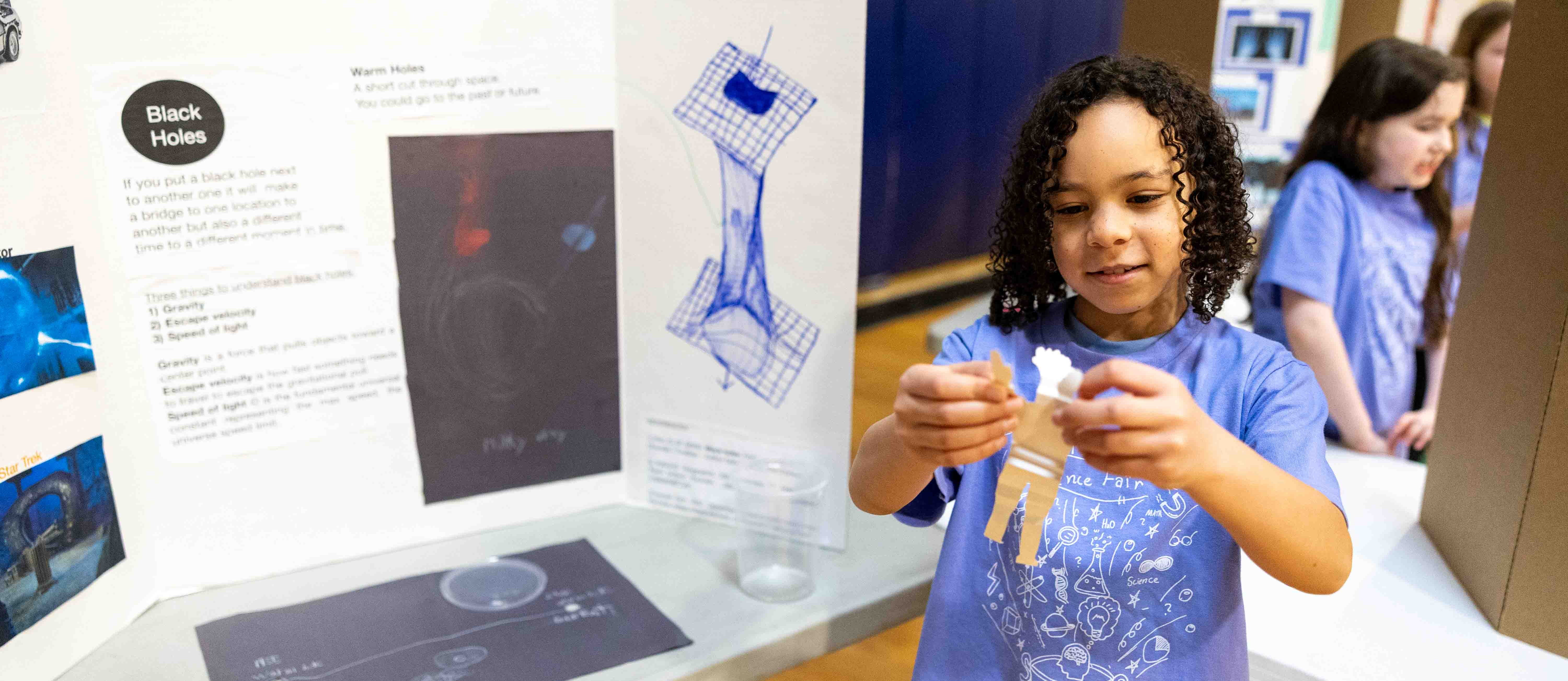 Student shows project off at the science fair