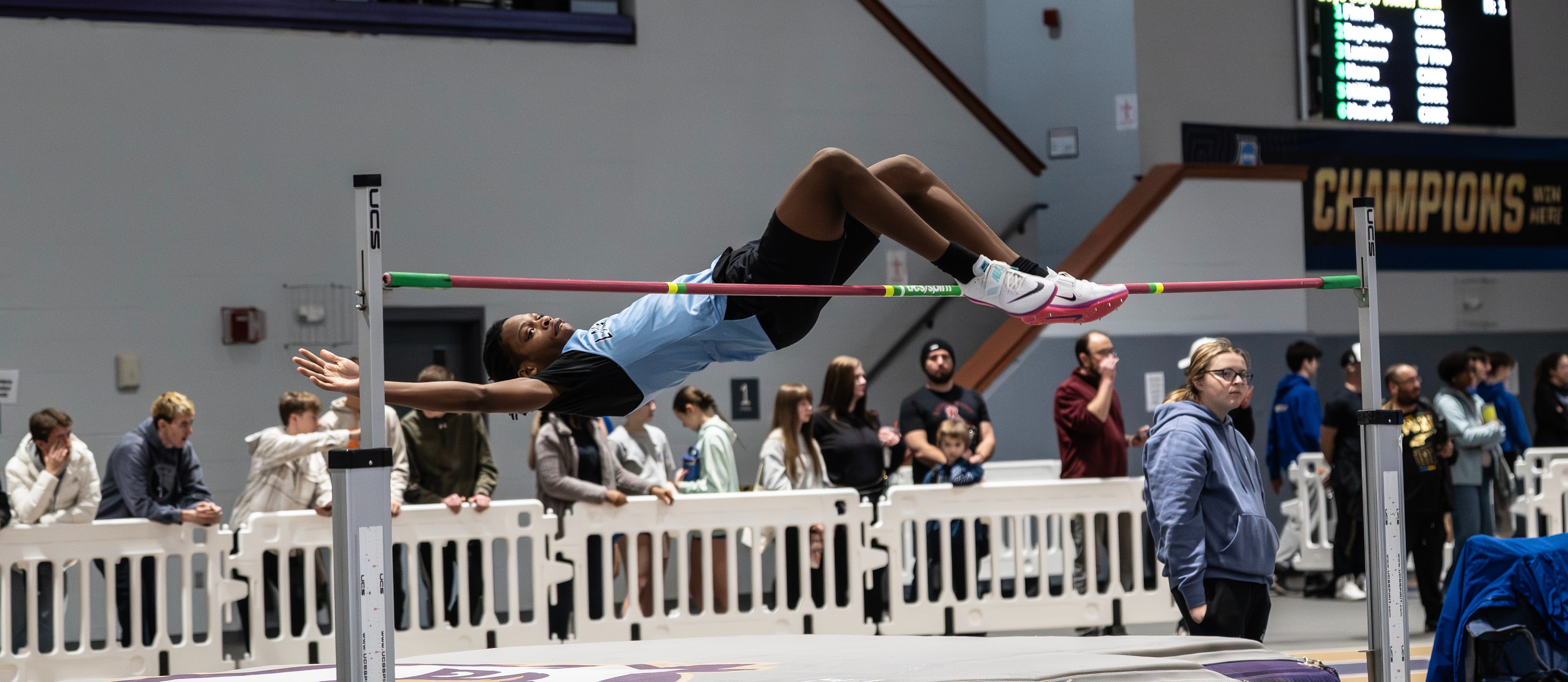 Students jumps over jumps