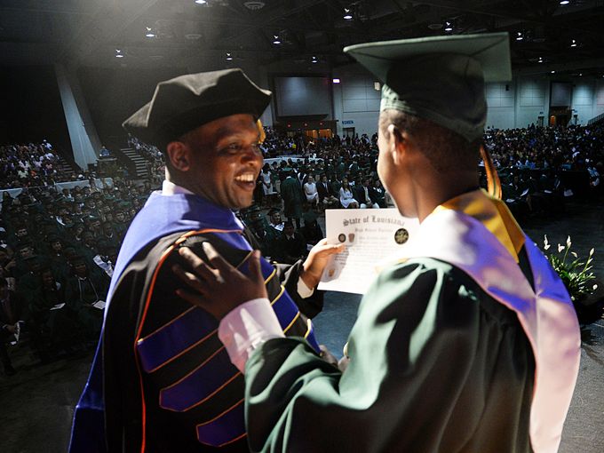 Happy on graduation stage