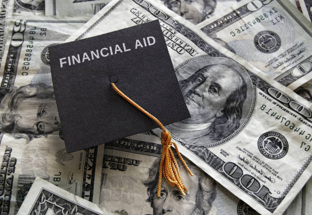 Picture of a graduation cap with money and the words Financial aid on the cap