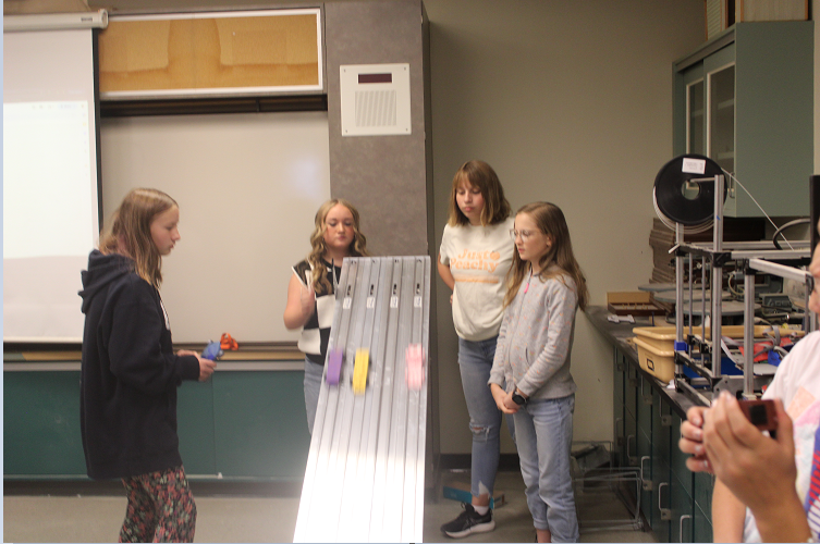 Students racing cars in Mr. Segler's class