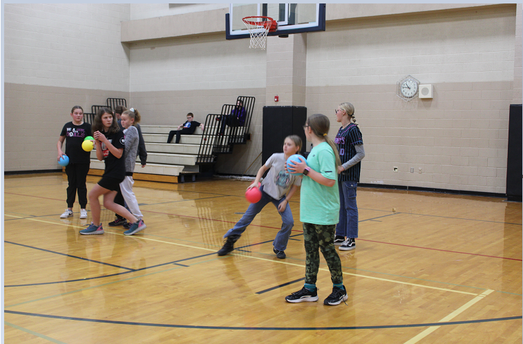 students playing dodge ball