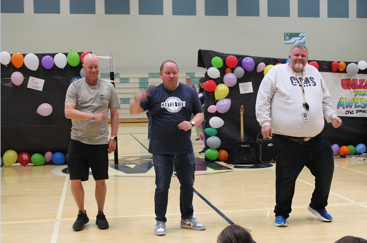 teachers performing  at annual talent show