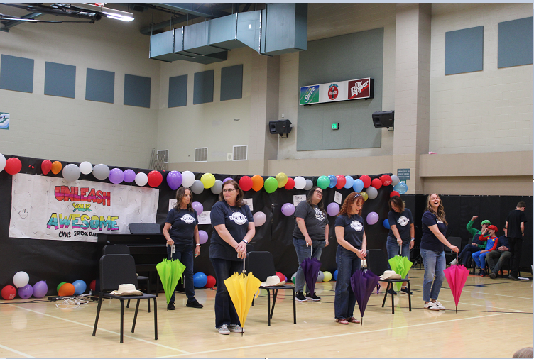 teachers performing  at annual talent show
