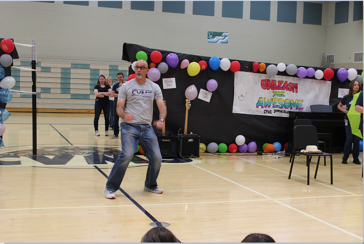 teachers performing  at annual talent show