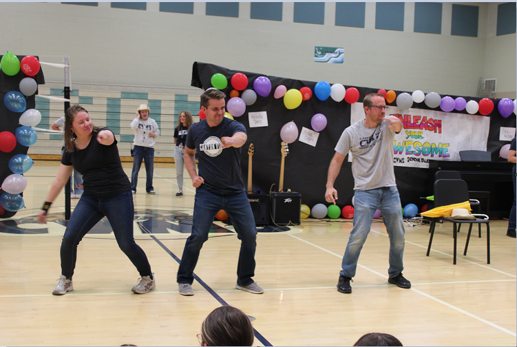 teachers performing  at annual talent show